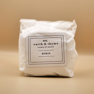 Bag of Borax labeled 'earth & thyme' on a beige background