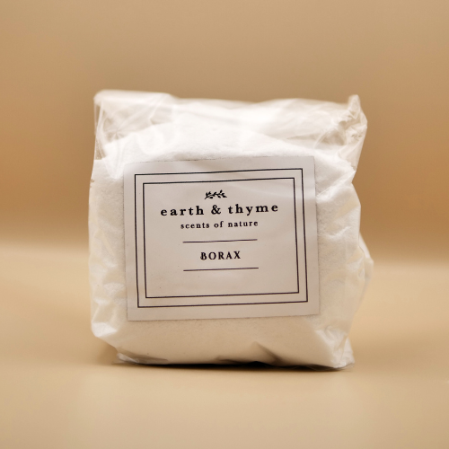 Bag of Borax labeled 'earth & thyme' on a beige background