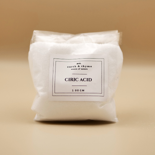 Bag of citric acid with a label on a beige background