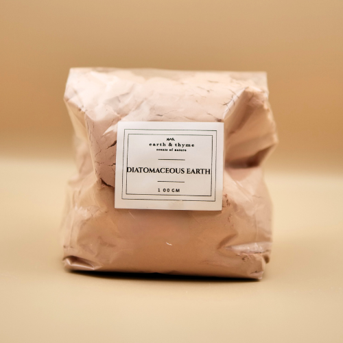 Package of diatomaceous earth with a label on a beige background